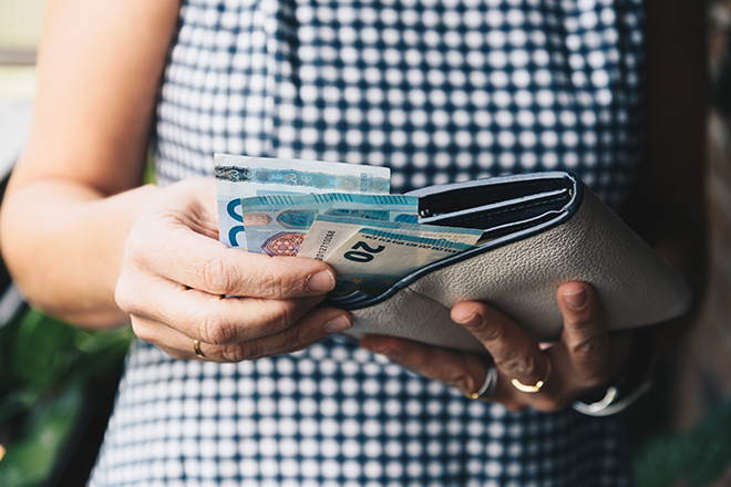 Close-Up Of Woman Holding Wallet